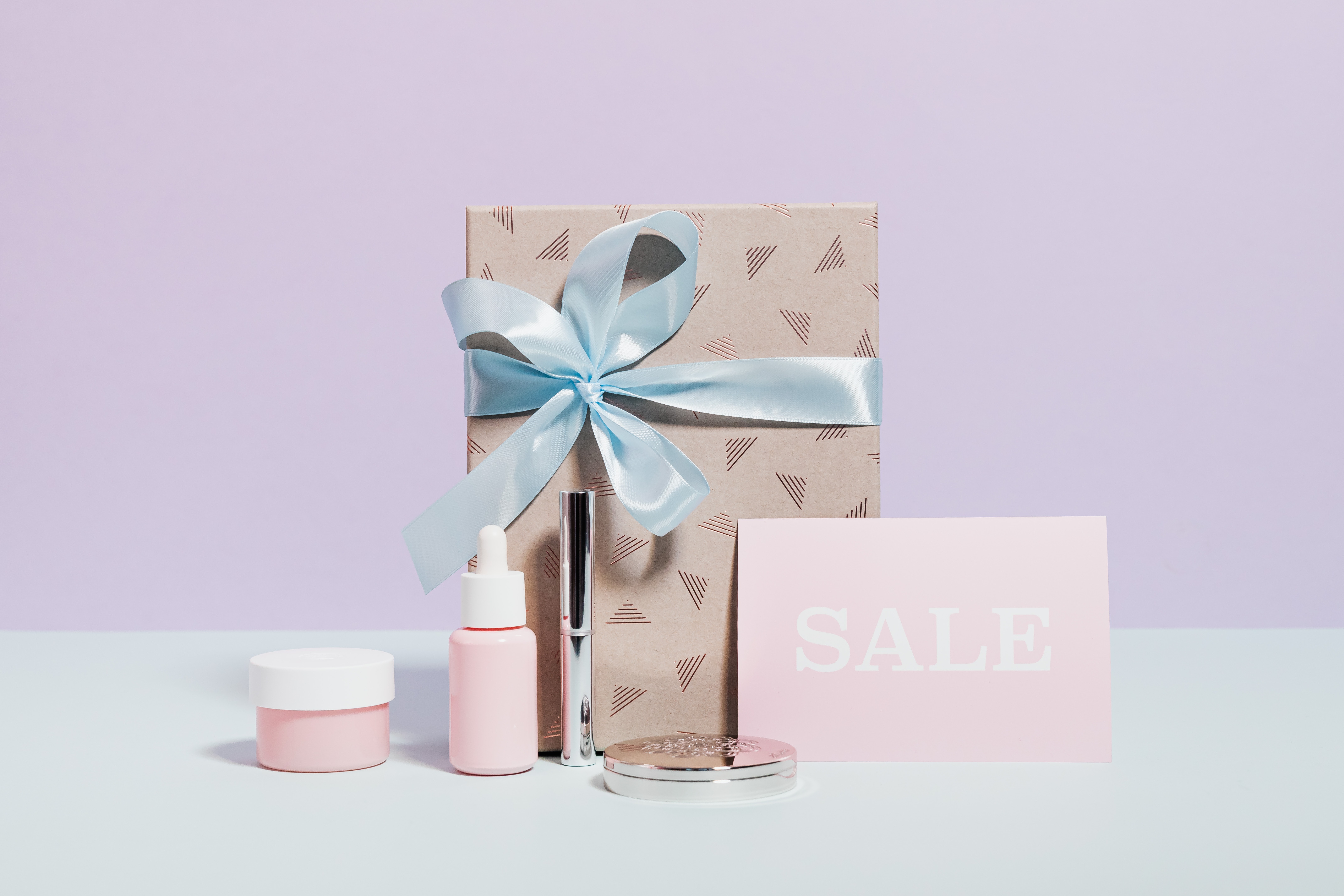 cosmetic products banner with sale sign
